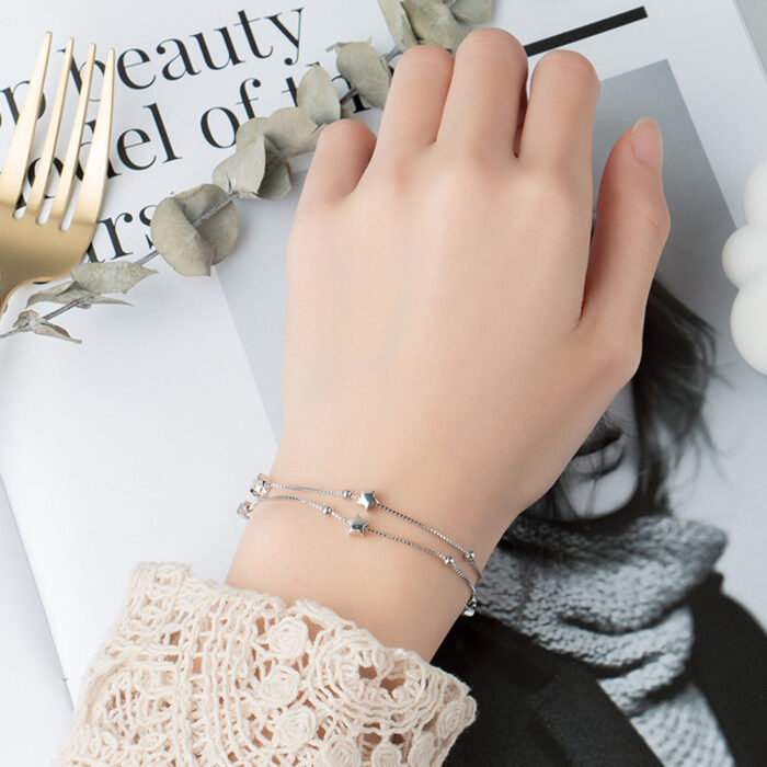 Zilveren layer armband met sterren en kraaltjes - Afbeelding 2